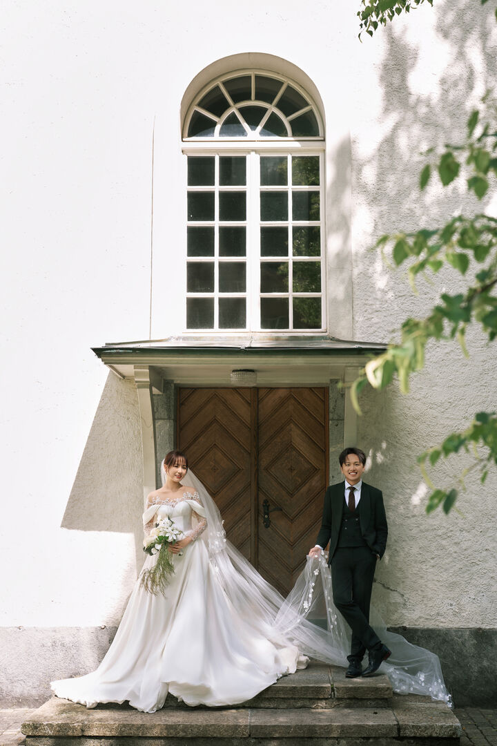 Lawren and Alex outside a small church in Lauterbrunnen, Switzerland